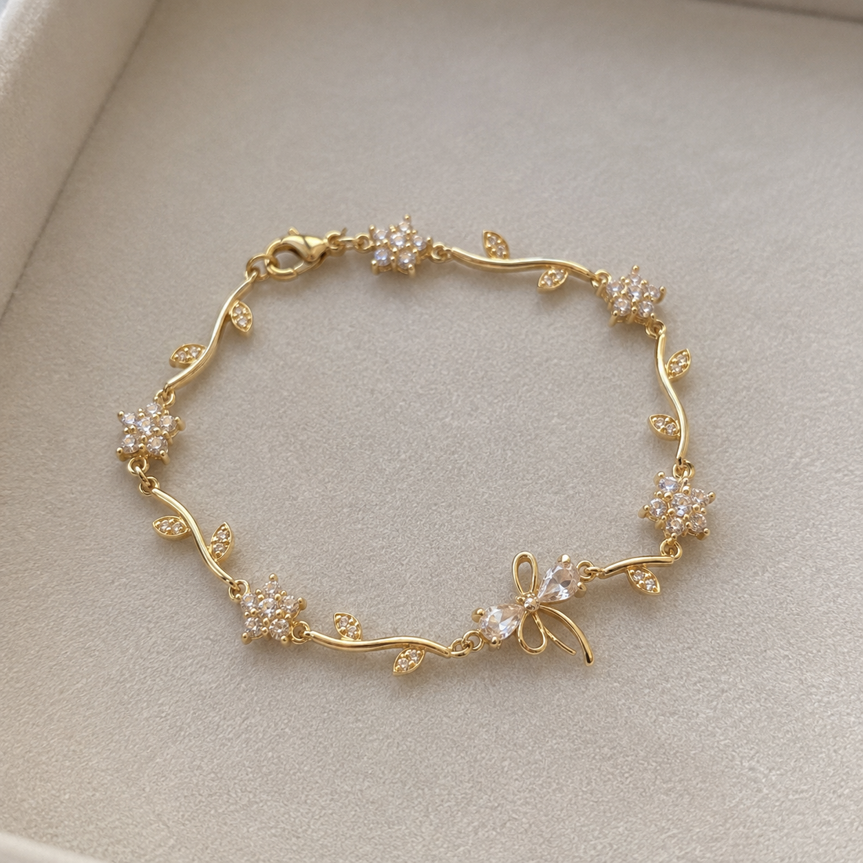White Bow Gold Bracelet